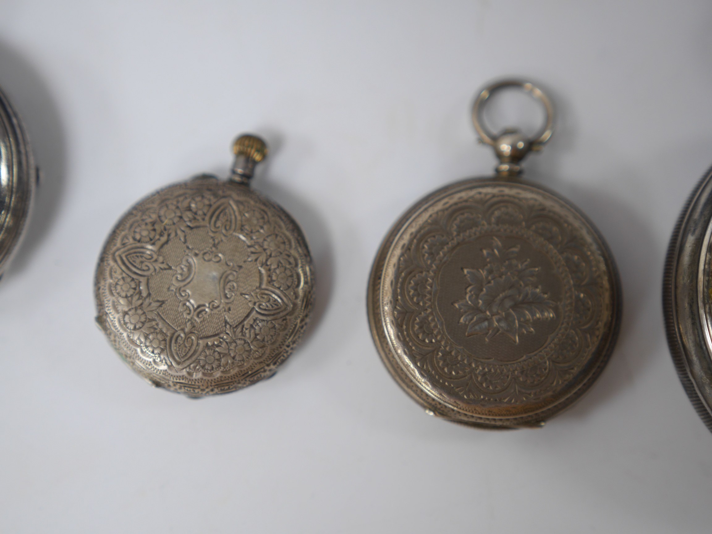 Six assorted pocket and fob watches, including a Victorian silver open faced, case diameter 62mm, a silver half hunter pocket watch with a silver albert and a small plated bosun's call. Condition - poor to fair to good